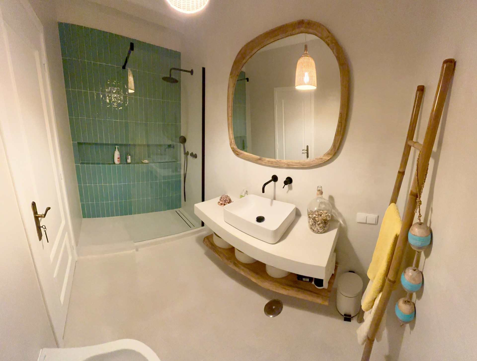 with organic wooden mirror and coastal details